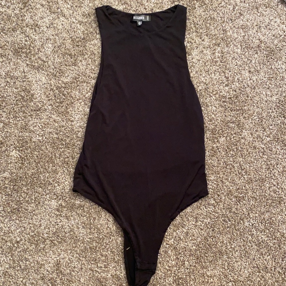 Soft silky bodysuit never worn